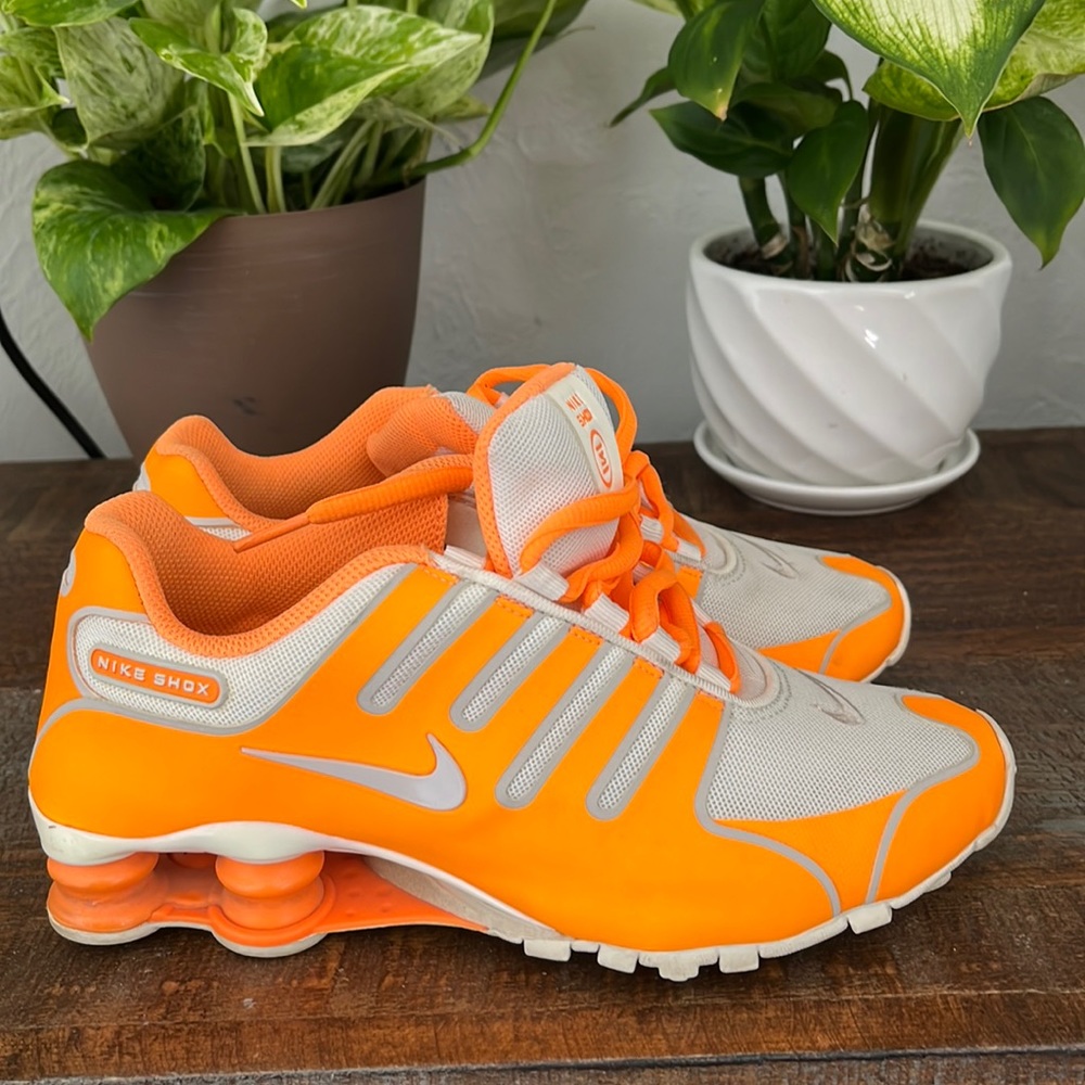 Orange and white Nike Shox size 6.5